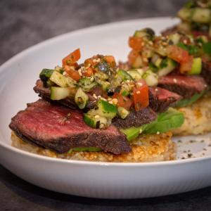 Crispy rice cakes with Wagyu hanger steak, avocado and furikake
