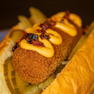 Brioche bun with rendang croquette
