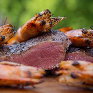 Surf and turf of flat iron steak and grilled shrimp