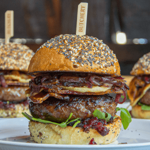 Gorgonzola burgers with cranberry compote, pancetta, and grilled apple