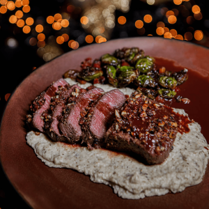 Venison steak with port-chocolate jus and parsnip purée
