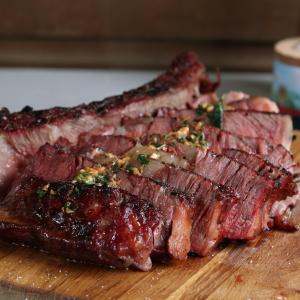Reverse sear Tomahawk with coboy butter