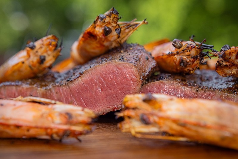 Surf and turf of flat iron steak and grilled shrimp