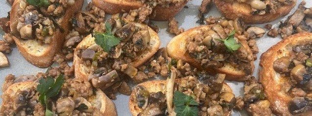 Mushroom crostini with sausages