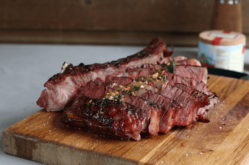 Reverse sear Tomahawk with coboy butter